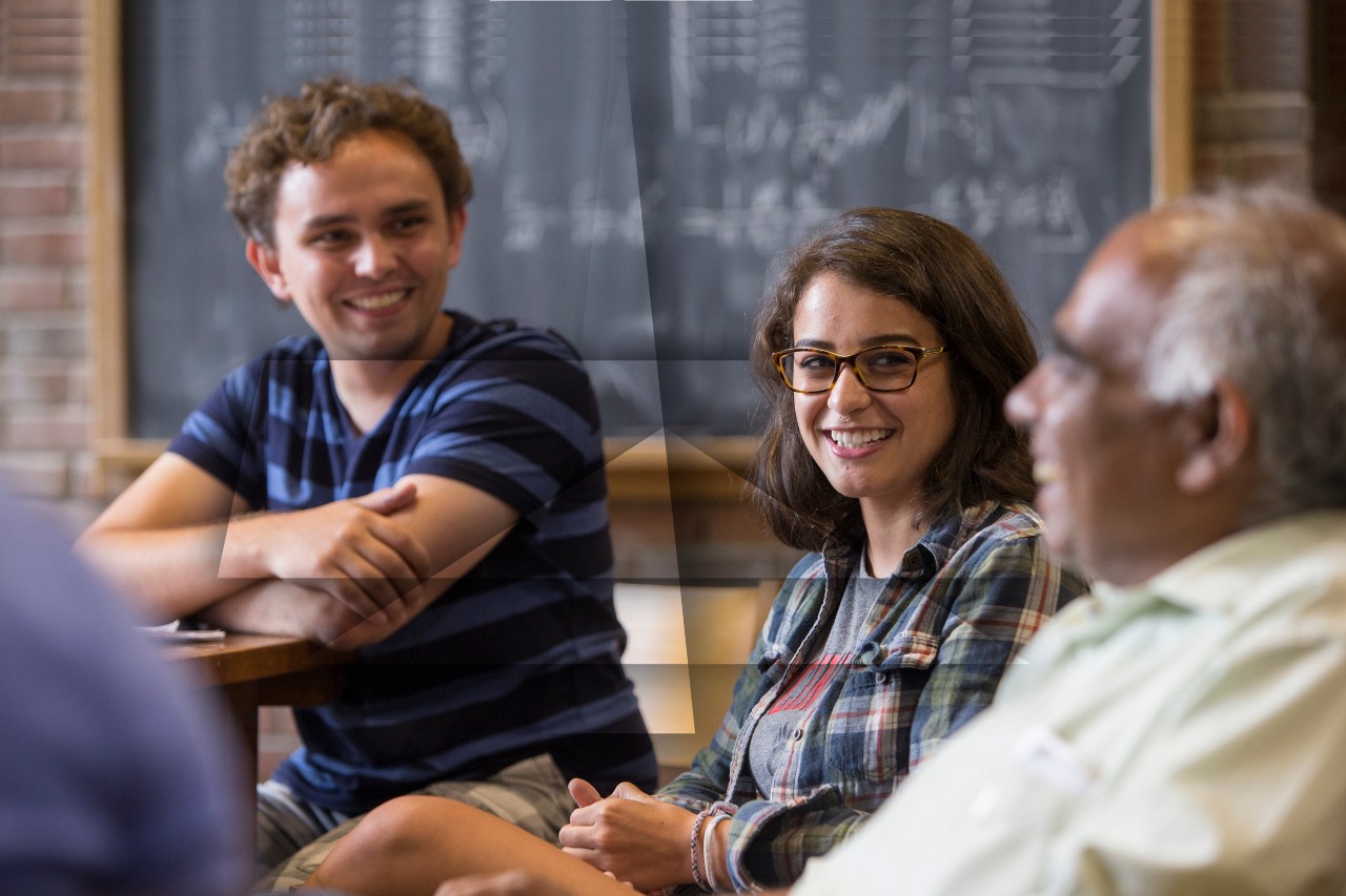 Students conversing in a classroom